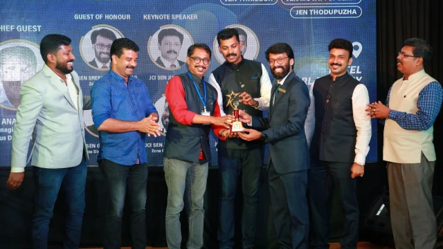 Kishore Receiving Award